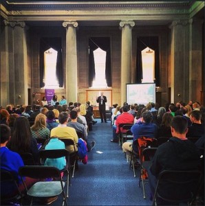 Families listen to a presentation on Study Abroad in Dinand Library.