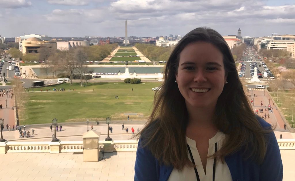 Woman on balcony overlooking National Mall in Washington, D.C.