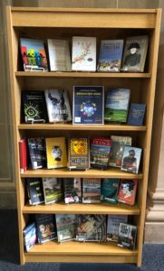 A display of books on a bookshelf.